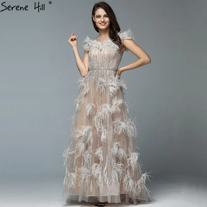 nude organza dress Amirah Hourglass Extended Flap Organza Voile Mini Dress